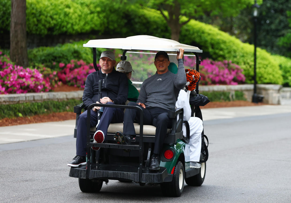 AUGUSTA, GEORGIA - APRIL 09: Tiger Woods of the United States and Executive Vice President at TGR, Rob McNamara, ride in a cart prior to a practice round prior to the 2024 Masters Tournament at Augusta National Golf Club on April 09, 2024 in Augusta, Georgia. (Photo by Maddie Meyer/Getty Images)