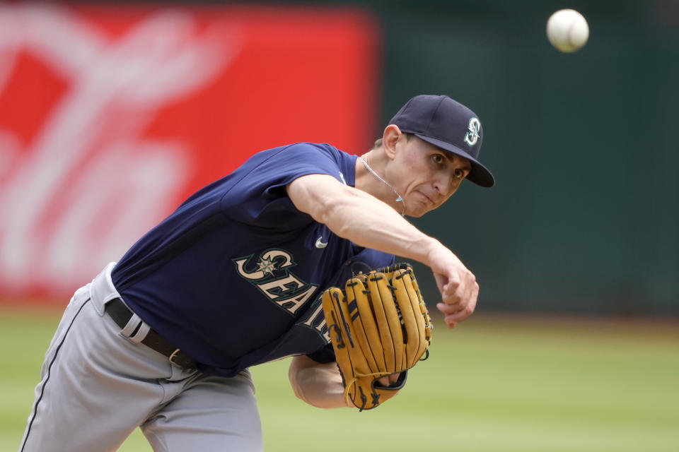 Seattle Mariners pitcher George Kirby works against the Oakland Athletics during the first inning of a baseball game in Oakland, Calif., Thursday, May 4, 2023. (AP Photo/Tony Avelar)