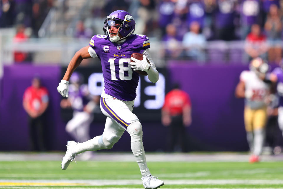 MINNEAPOLIS, MINNESOTA - SEPTEMBER 15: Justin Jefferson #18 of the Minnesota Vikings scores a rushing touchdown against the San Francisco 49ers during the second quarter at U.S. Bank Stadium on September 15, 2024 in Minneapolis, Minnesota. (Photo by Adam Bettcher/Getty Images)