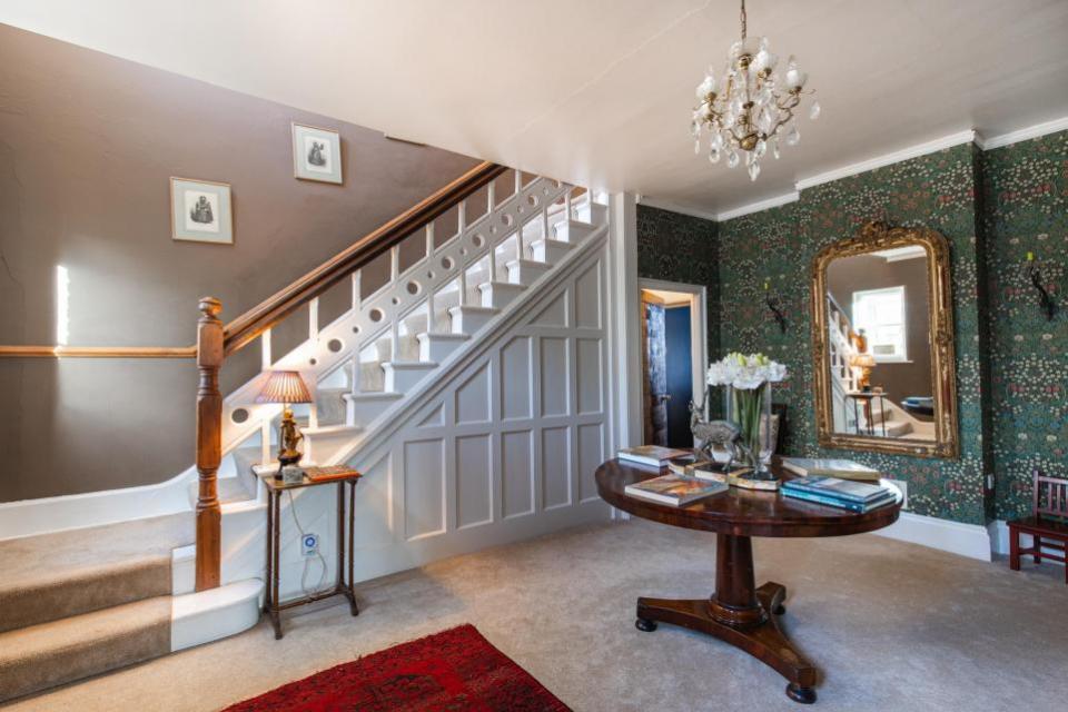 Eastern Daily Press: The entrance hall welcomes you in, with stairs leading up to the seven bedrooms