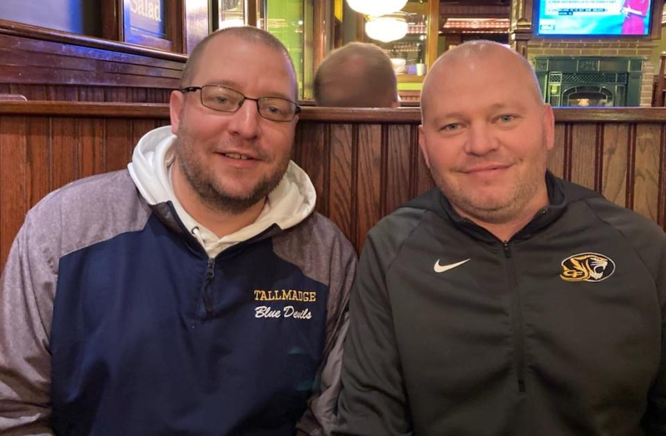 Tallmadge athletic director Bill Johnson, left, and Cuyahoga Falls athletic director Kenny Johnson have been with and against each other for decades.