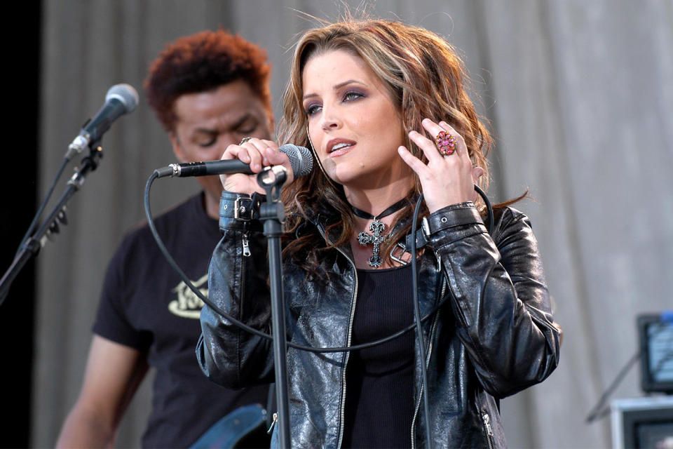 <p>In 2003, Lisa Marie dropped her debut rock album, <em>To Whom It May Concern</em>, attempting to step out from her dad's shadow while also honoring his legacy. </p> <p>"I think that his music is probably embedded in me," she <a href="https://www.youtube.com/watch?v=pZHHXY8Q5yM" rel="nofollow noopener" target="_blank" data-ylk="slk:told Extra in 2013;elm:context_link;itc:0;sec:content-canvas" class="link ">told <em>Extra</em> in 2013</a>. "I could only hope that he would be proud." She went on to release two more albums: <em>Now What</em> in 2005 and <em>Storm & Grace</em> in 2012. </p>