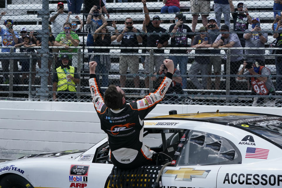 Josh Berry (8) celebrates winning the rain delayed NASCAR Xfinity Series auto race at Martinsville Speedway in Martinsville, Va., Sunday, April 11, 2021. (AP Photo/Steve Helber)