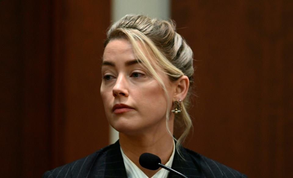 Actor Amber Heard testifies in the courtroom at the Fairfax County Circuit Courthouse in Fairfax, Va., on May 17, 2022.