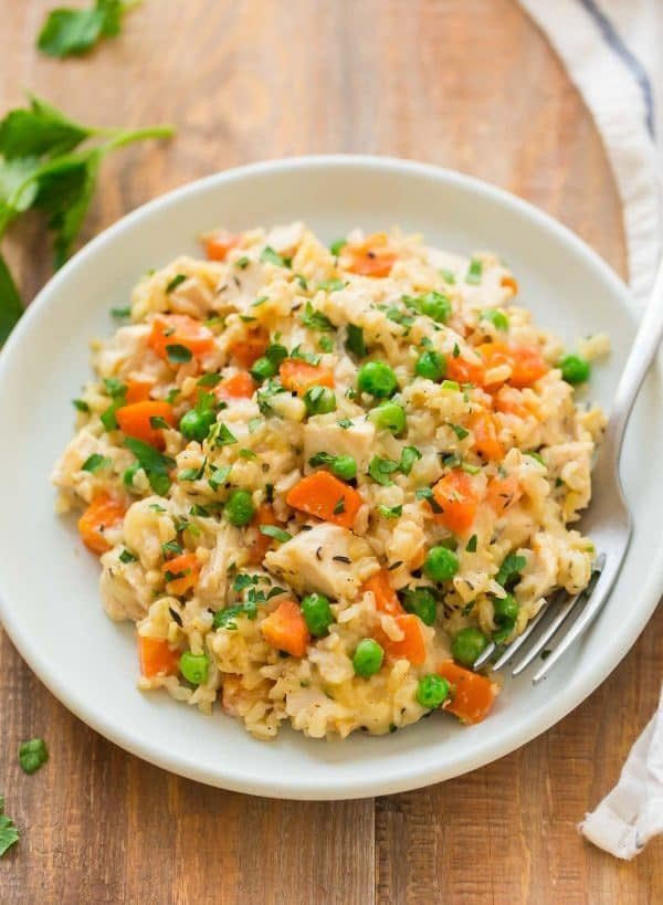 <strong>Get the <a href="https://www.wellplated.com/crock-pot-chicken-and-rice/" target="_blank">Crock Pot Chicken and Rice</a> recipe from Well Plated</strong>