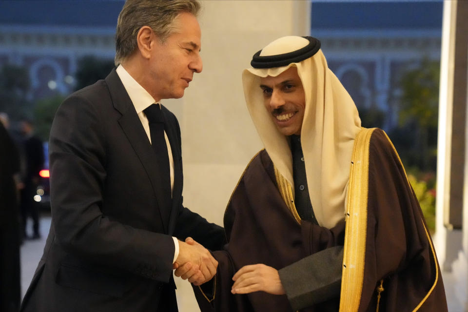 US Secretary of State Antony Blinken is greeted by Saudi Arabia's Foreign Minister Prince Faisal bin Farhan Al-Saud, in Riyadh, Saudi Arabia, Monday, Feb. 5, 2024. (AP Photo/Mark Schiefelbein, Pool)