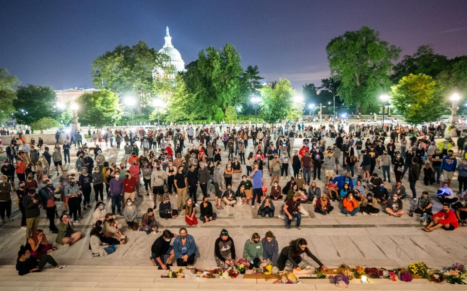 Mourners gather outside the US Supreme Court  - JIM LO SCALZO/EPA-EFE/Shutterstock