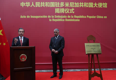 China's Foreign Minister Wang Yi speaks next to Dominican Republic's Chancellor Miguel Vargas during the opening of a new Chinese Embassy in the Dominican Republic, in Santo Domingo, Dominican Republic, September 21, 2018. REUTERS/Ricardo Rojas