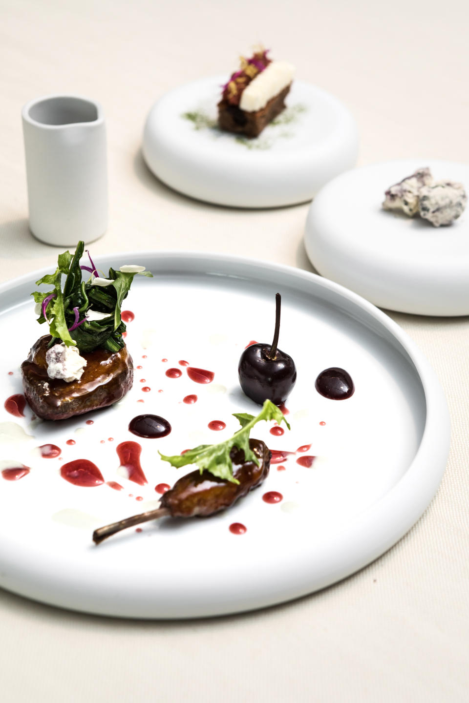 A 2014 dish included in the Signature menu: pigeon with cherries, buffalo blue cheese and chicory.