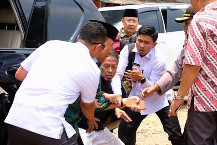 Indonesia's Chief Security Minister Wiranto is pictured as he being attacked during his visit in Pandeglang