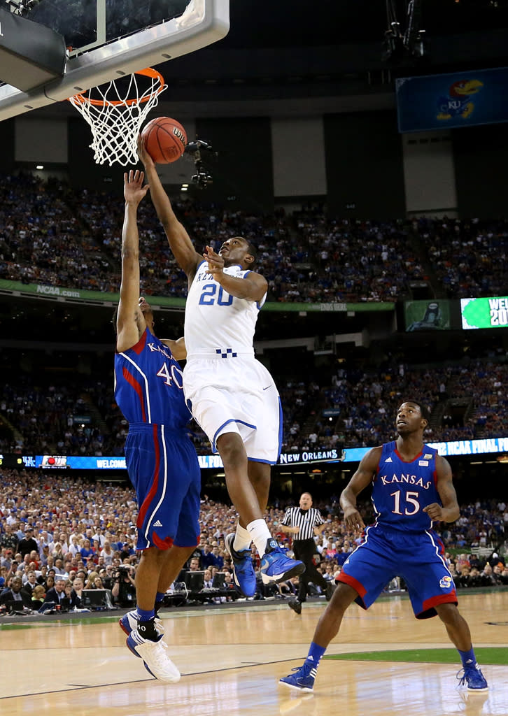 Doron Lamb #20 of the Kentucky Wildcats goes up for a shot against Kevin Young #40 of the Kansas Jayhawks in the first half in the National Championship Game of the 2012 NCAA Division I Men's Basketball Tournament at the Mercedes-Benz Superdome on April 2, 2012 in New Orleans, Louisiana. (Photo by Ronald Martinez/Getty Images)