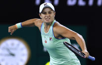 Australia's Ashleigh Barty celebrates after defeating Alison Riske of the U.S. during their fourth round singles match at the Australian Open tennis championship in Melbourne, Australia, Sunday, Jan. 26, 2020. (AP Photo/Andy Wong)