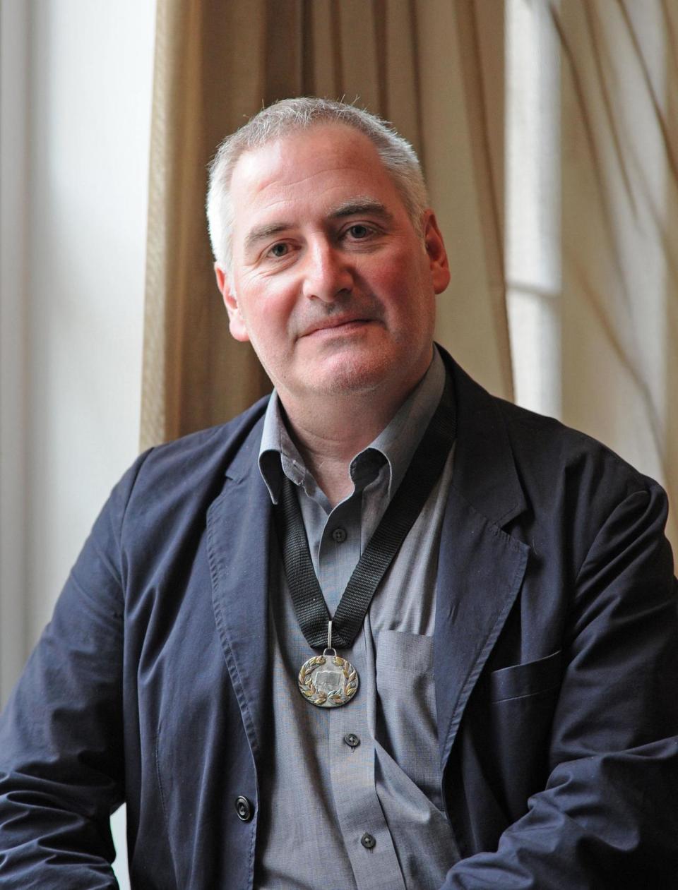 Author, illustrator and political cartoonist Chris Riddell wrote and illustrated Mr Underbed (PA)