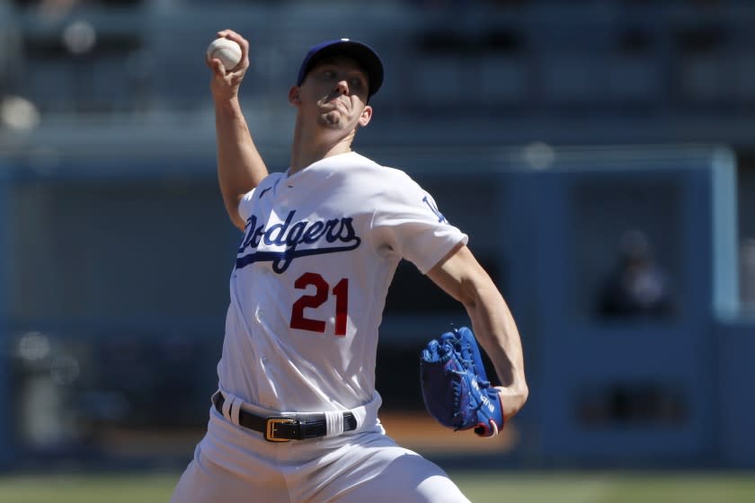 Los Angeles Dodgers starting pitcher Walker Buehler throws to a Milwaukee Brewers batter.