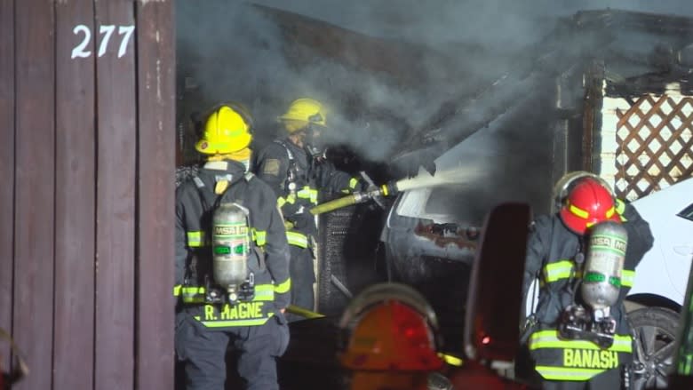 Two vehicles, Hydro pole damaged in Norwood-area garage fire