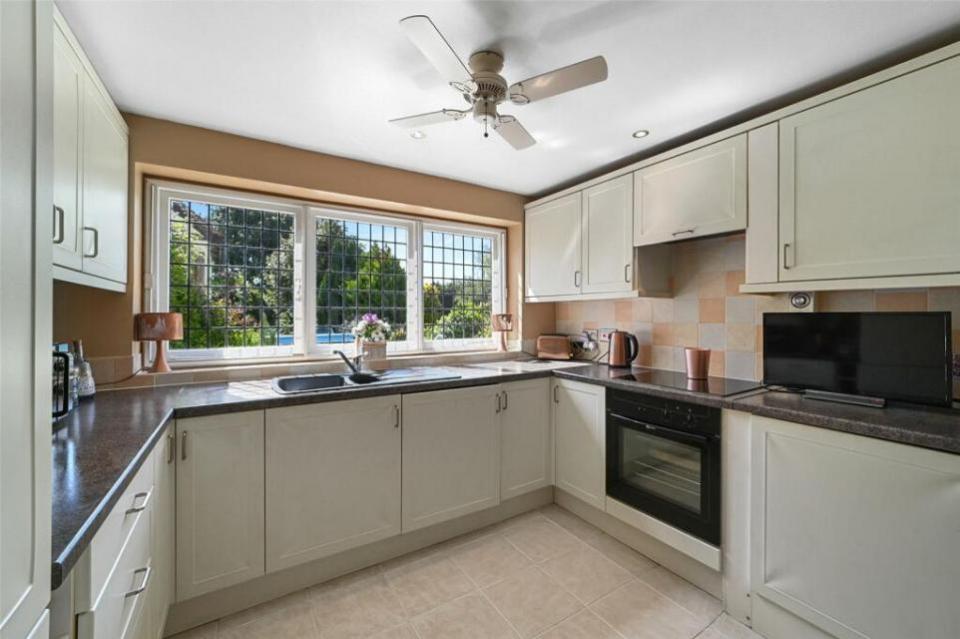 East Anglian Daily Times: The kitchen is in the modern part of the cottage