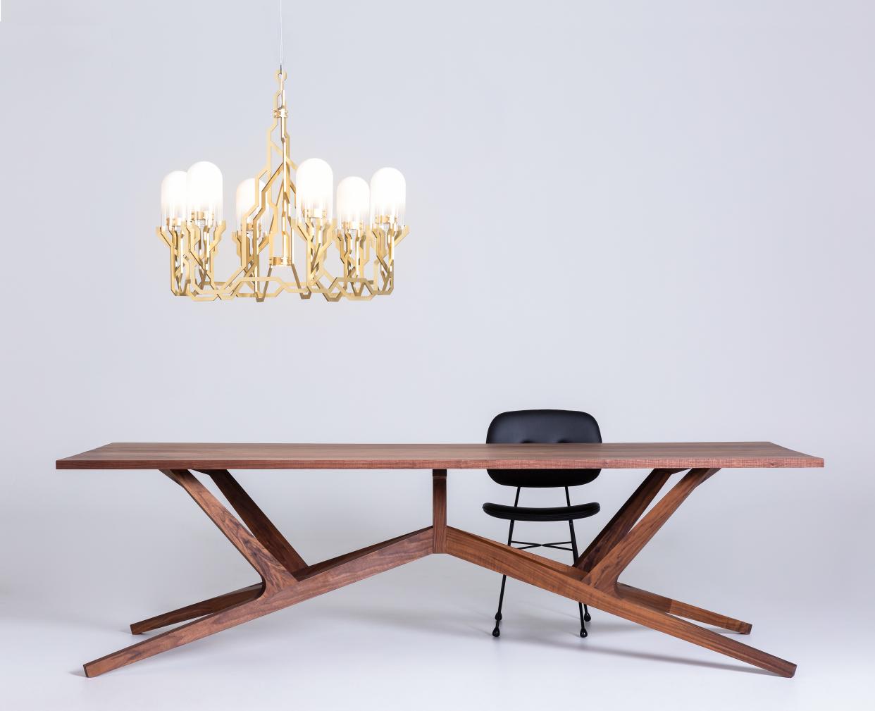 Atelier Van Lieshout's Liberty table with Kranen/Gille's Plant chandelier for Moooi.