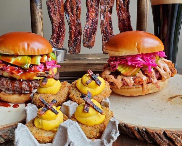 Burgers at Sid's Garage, an Idaho-based restaurant that opened in Phoenix in April 2022.