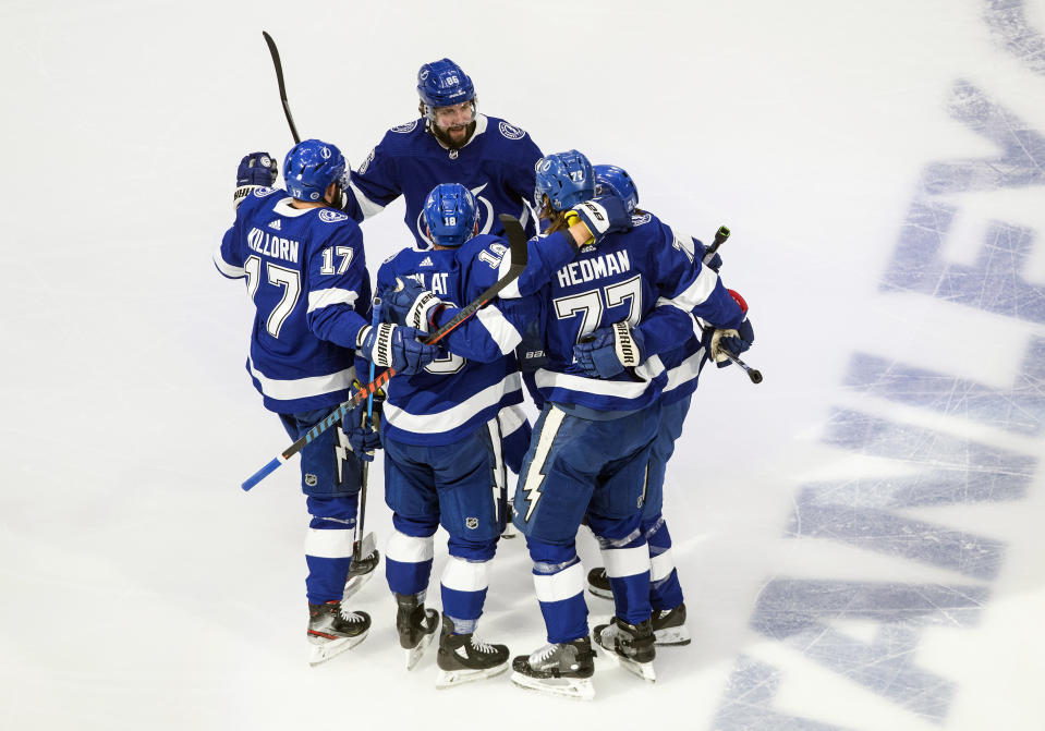 Tampa Bay Lightning' Victor Hedman (77) celebrates a goal against the New York Islanders with teammates during first-period NHL Eastern Conference final playoff game action in Edmonton, Alberta, Monday, Sept. 7, 2020. (Jason Franson/The Canadian Press via AP)