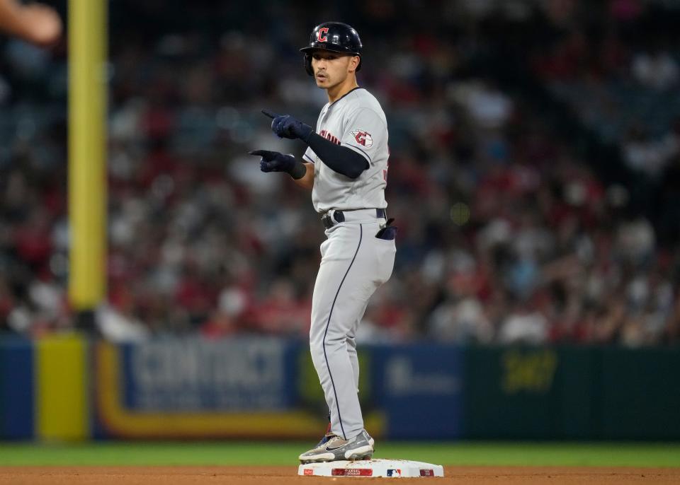 Cleveland Guardians' Steven Kwan (38) celebrates after a double Sept. 8 against the Los Angeles Angels in Anaheim, Calif.