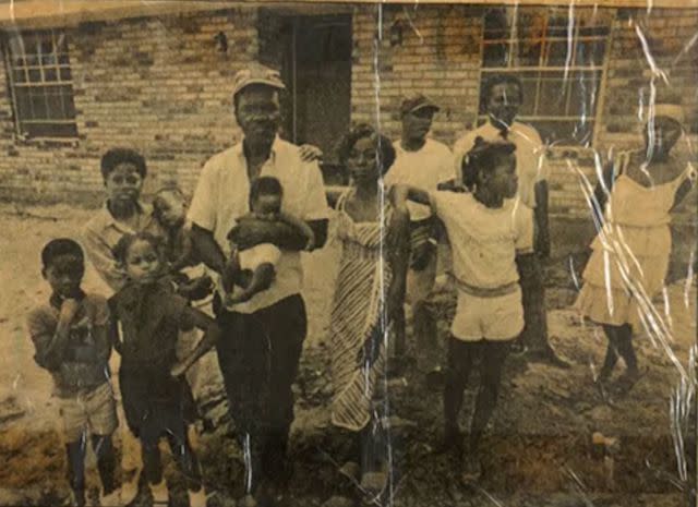 <p>National Center for Missing and Endangered Children</p> The Brown family outside their New Orleans home.