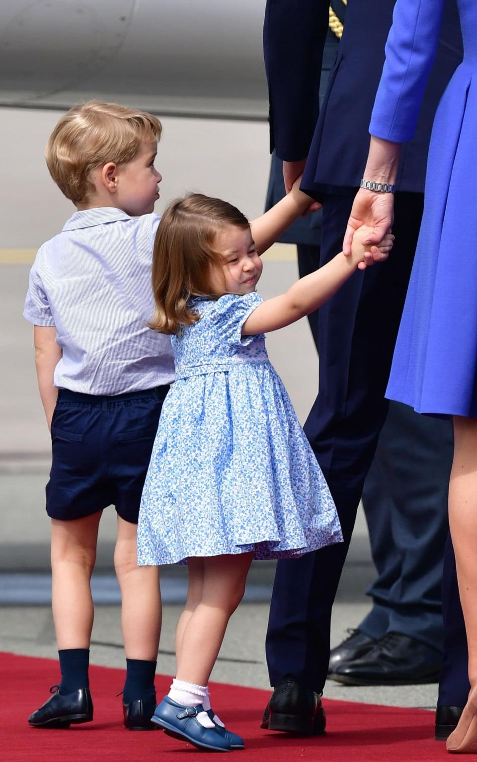 Prince George and Princess Charlotte leave Warsaw, Poland, as they head to Germany - Credit: Dominic Lipinski/PA