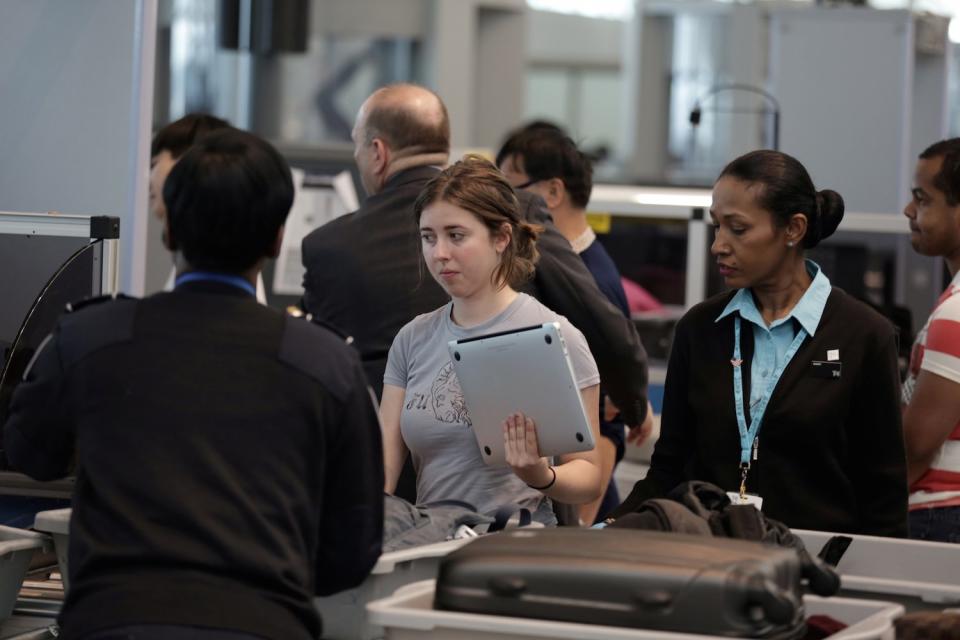 Airport security laptops