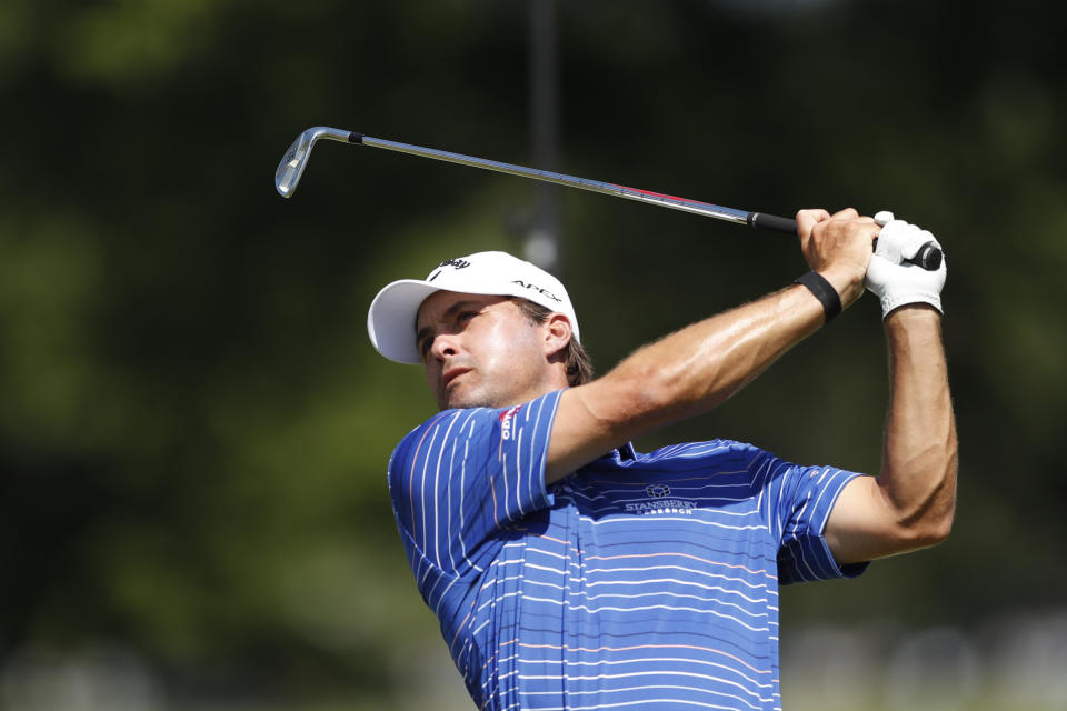 Kevin Kisner hits from the 15th tee during the second round of the Rocket Mortgage Classic golf tournament, Friday, July 3, 2020, at the Detroit Golf Club in Detroit. (AP Photo/Carlos Osorio)