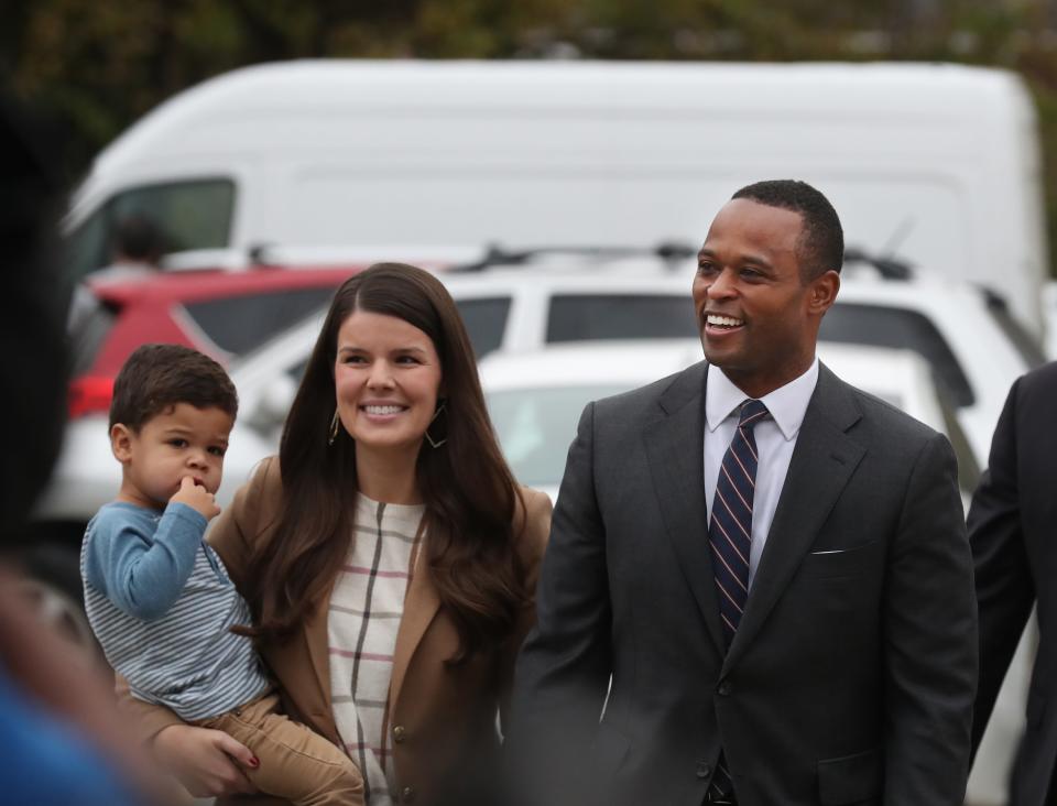 Governor candidate Daniel Cameron leaves Wilder Elementary where he and his wife Makenze voted. Theodore, their first child, his being carried by Makenze.
Nov. 7, 2023