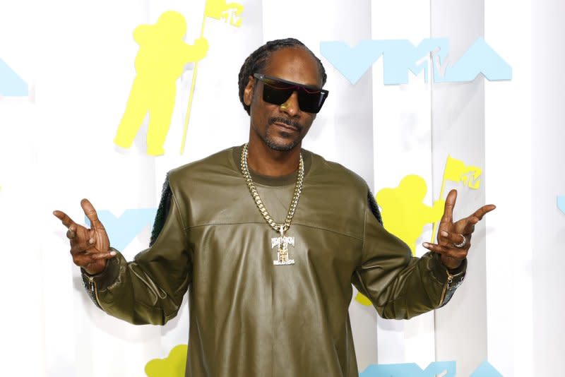 Snoop Dogg raps on Keith Urban's "Let It Roll." File Photo by John Angelillo/UPI