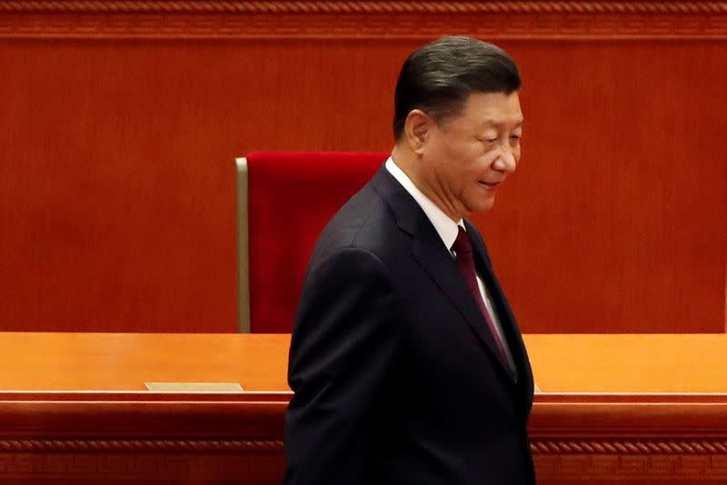 FILE PHOTO: Chinese President Xi Jinping arrives for a meeting in Beijing