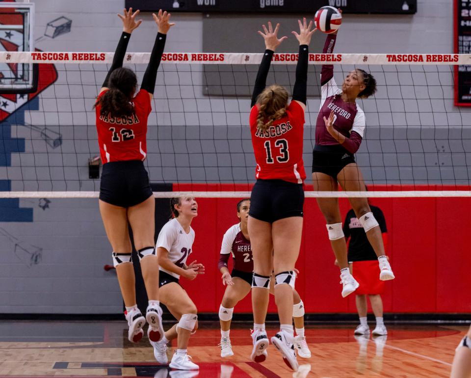 Hereford's Nickilah Whatley (3) hits at the match against Tascosa, Tuesday, Aug. 23, 2022, at Amarillo High School. Hereford won the match.