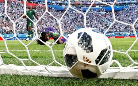 Soccer Football - World Cup - Group D - Nigeria vs Argentina - Saint Petersburg Stadium, Saint Petersburg, Russia - June 26, 2018 The ball hits the back of the net as Argentina's Lionel Messi scores their first goal REUTERS/Henry Romero