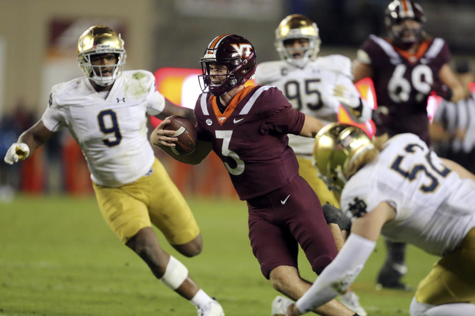 Virginia Tech quarterback Braxton Burmeister (3) runs for a touchdown during the second half of an NCAA college football game against Notre Dame in Blacksburg, Va., Saturday, Oct. 9, 2021. (AP Photo/Matt Gentry)