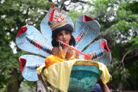 <p>Hindu devotees parade as they take part in the celebrations of Janmashtami, a festival marking the birth of Hindu deity Krishna, in Dhaka, Bangladesh, on September 02, 2018. According to mythology and the Hinduism holy book Puranas, Krishna is the incarnation of Lord Vishnu, who took birth to kill his maternal uncle the evil king Kansa and free the people of Mathura and other nearby towns from his cruelty and save them from his evil clutches. (Photo by Mamunur Rashid/NurPhoto via Getty Images) </p>