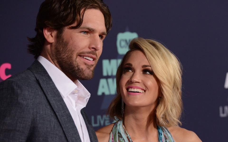 Nashville Predators captain Mike Fisher and country music star Carrie Underwood.