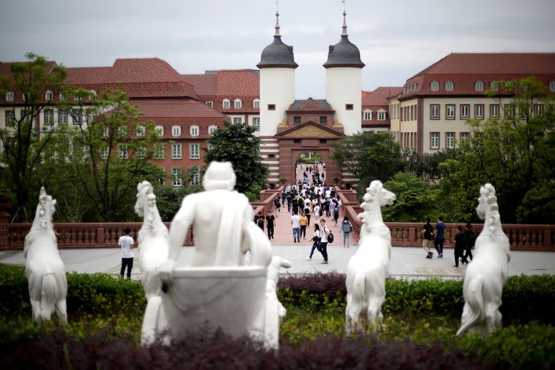 FILE PHOTO: Employees are seen after a workday at Huawei Songshan Lake New Campus in Dongguan