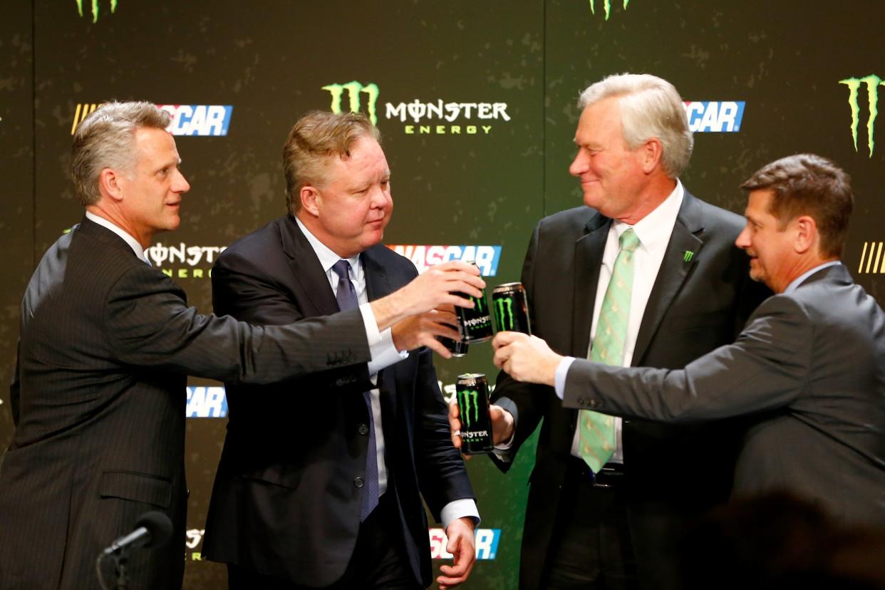 NASCAR and Monster executives toast the sponsorship announcement. (Getty)