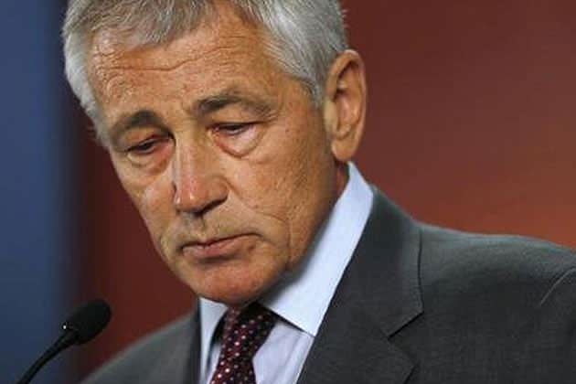 U.S. Defense Secretary Chuck Hagel says "the Department of Defense intends to make the same benefits available to all military spouses—regardless of sexual orientation—as soon as possible." (Jason Reed/Reuters)