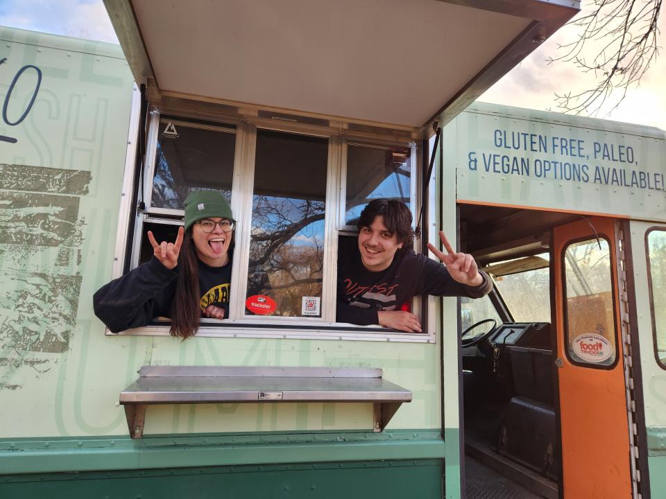 Former Avuncular Bob's employees Kimmy Gall and Robert Gardin pose with their food truck after purchasing it. The duo plans to open Bobs, a Fort Collins food truck inspired by their time at Avuncular Bob's, this April.