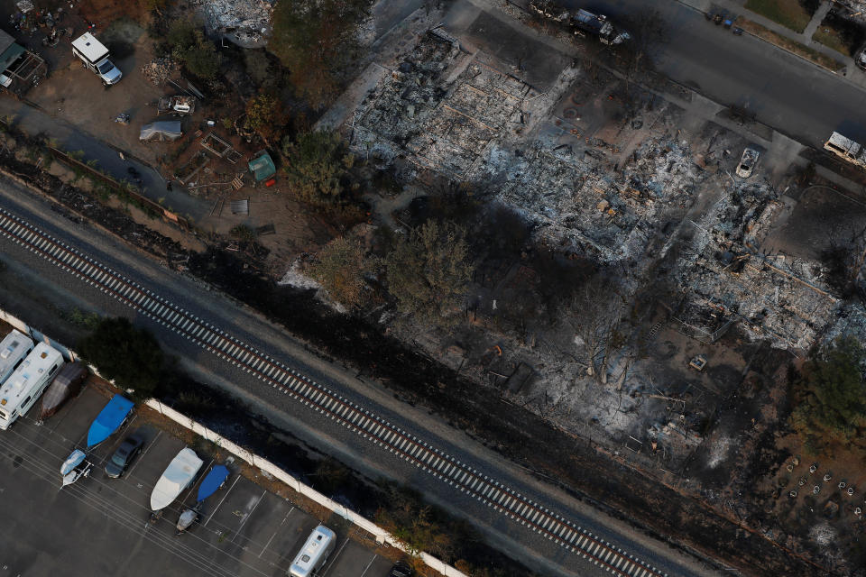 <p>An aerial view of properties destroyed by the Tubbs Fire is seen in Santa Rosa, Calif., Oct. 11, 2017. (Photo: Stephen Lam/Reuters) </p>