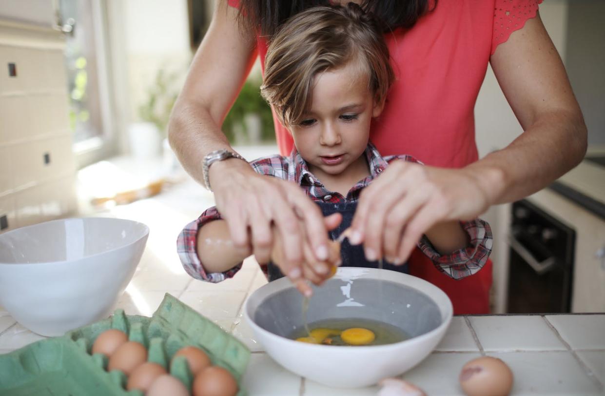 <span class="caption">In some households, children have been learning to cook and bake while parents are home during the pandemic. </span> <span class="attribution"><a class="link " href="http://gettyimages.com" rel="nofollow noopener" target="_blank" data-ylk="slk:Catherine Delahaye via Getty Images;elm:context_link;itc:0;sec:content-canvas">Catherine Delahaye via Getty Images</a></span>