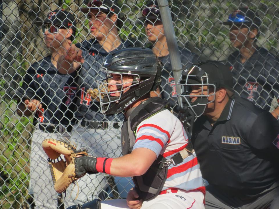 Fair Lawn senior Liam Wozniak favors the use of an electronic device that allows coaches to provide pitches, location and advice to the catcher during games.