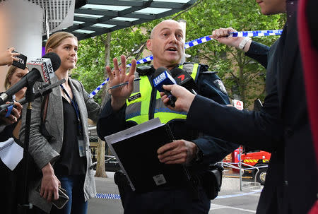 Victoria Police Superintendent David Clayton speaks to members of the media near the Bourke Street mall in central Melbourne, Australia, November 9, 2018. AAP/James Ross/via REUTERS