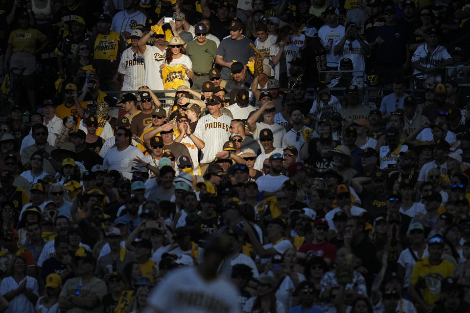 Fans watch during the ninth inning in Game 2 of the baseball NL Championship Series between the San Diego Padres and the Philadelphia Phillies on Wednesday, Oct. 19, 2022, in San Diego. (AP Photo/Gregory Bull)