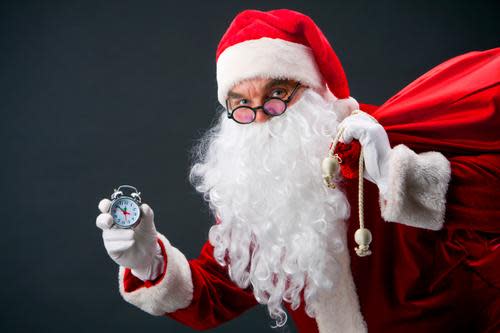 Santa holding a watch