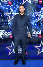 <p>Liam Payne chose a dapper navy double-breasted suit for the annual star-studded ceremony. <em>[Photo: Getty]</em> </p>