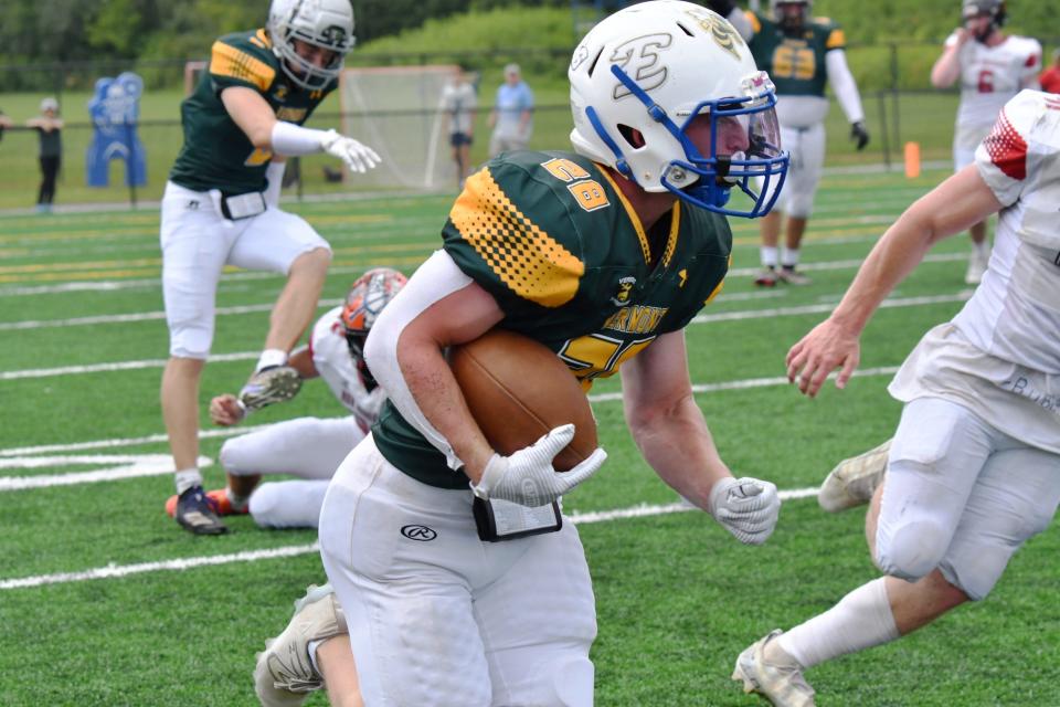 Caleb LeVasseur runs with the ball during Vermont's 28-6 Shrine Bowl win on August 5, 2023 at Castleton University.