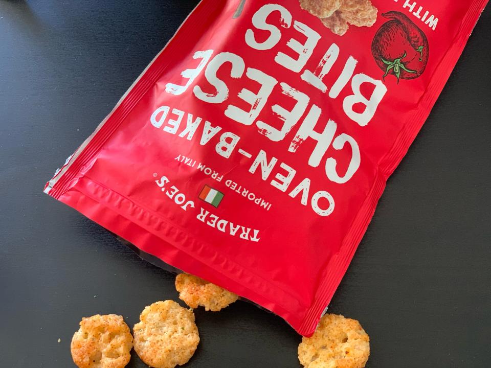 red bag of trader joe's cheese bites with some spilling out