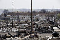 The devastated neighbourhood of Abasand is shown after being ravaged by a wildfire in Fort McMurray, Alberta, Canada, May 13, 2016. REUTERS/Jason Franson/Pool